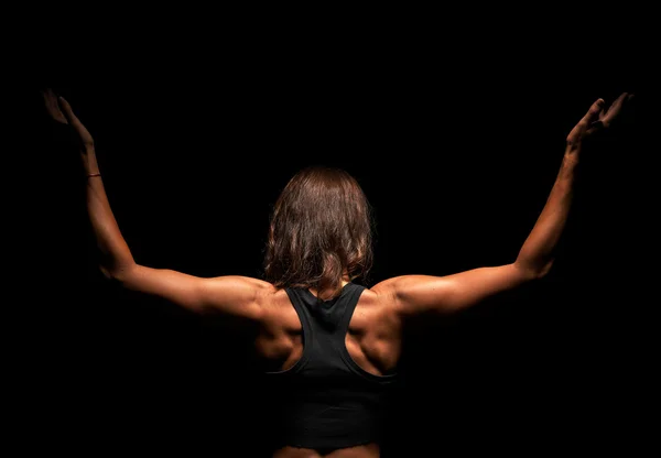 Corpo superiore di una donna muscolosa dalla schiena — Foto Stock