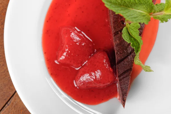 Chocolate cake with strawberry and chili — Stock Photo, Image