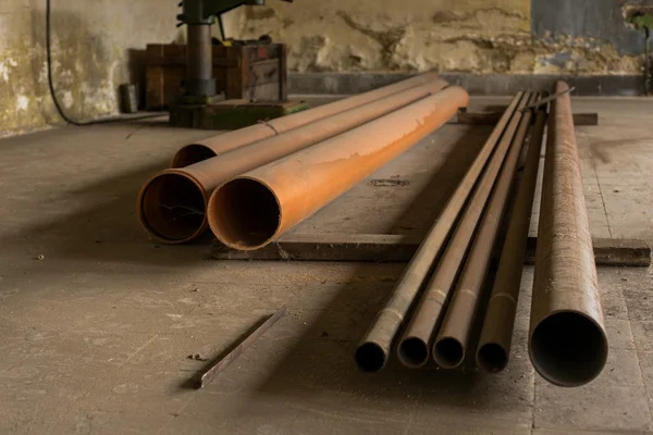 Piled Old, rusty, dirty pipes — Stock Photo, Image