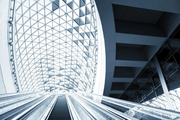 Moving escalator in the business center — Stock Photo, Image