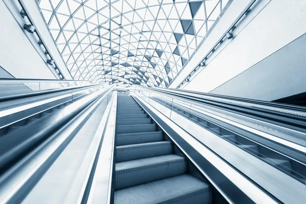 Moving escalator in the business center — Stock Photo, Image