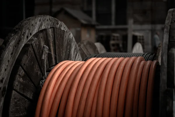 Electrical wires on wooden spool — Stock Photo, Image