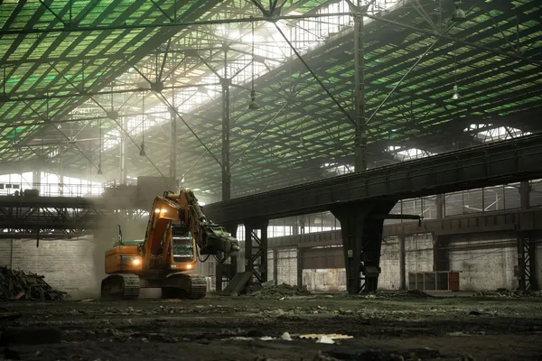 Industrial interior with bulldozer inside — Stock Photo, Image