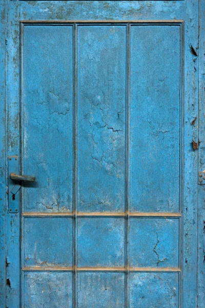 Close-up van een blauwe houten deur — Stockfoto