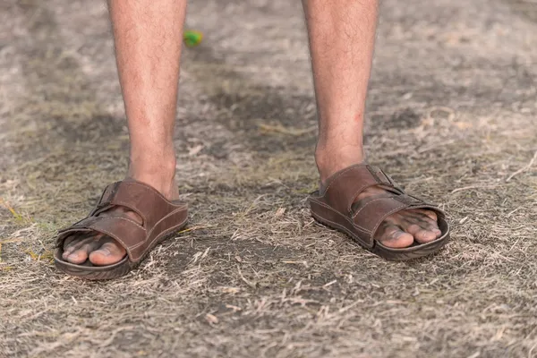 Feet of a sad farmer without crop — Stock Photo, Image