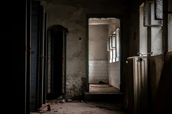 Dark room with steel lockers — Stock Photo, Image