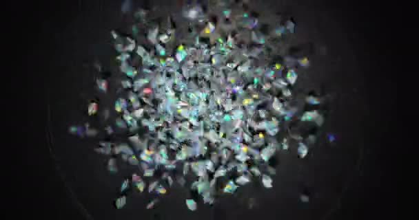 Маленькие красочные частицы трясутся на тёмном фоне — стоковое видео