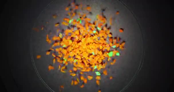 Petites particules colorées qui tremblent sur fond sombre — Video