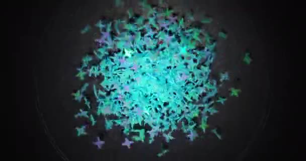 Małe kolorowe cząstki drżące na ciemnym tle — Wideo stockowe