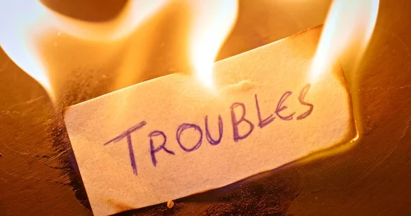 Close Video Burning Paper Troubles Written — Stock Photo, Image