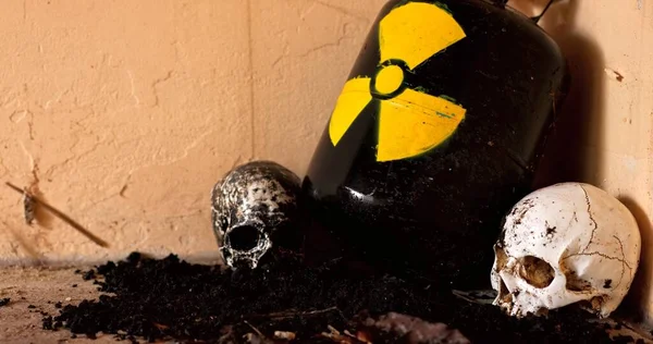 Nuclear waste between skulls close up