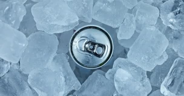 Tin can in ice rotating top view closeup footage — Αρχείο Βίντεο