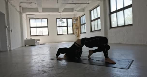 Dynamic Camera Movement Woman Doing Yoga Industrial Interior Closeup — Video