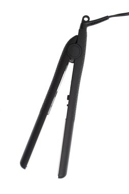 Beyaz arkaplanda saç düzleştirici izole edildi