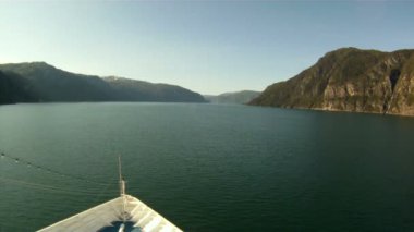 Sailing through the fjords of Norway on a sunny summer day