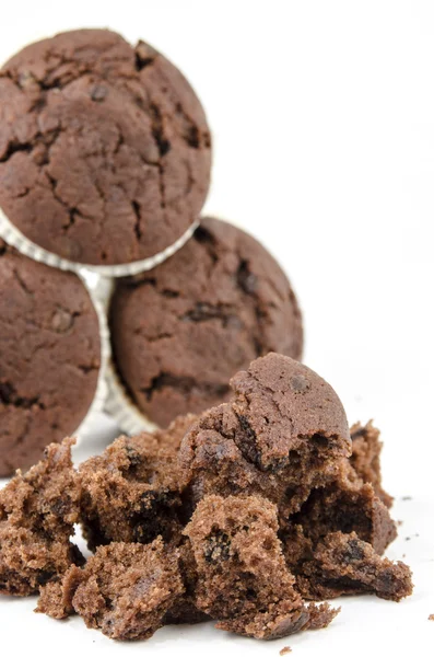 Chocolate muffins and crumbs — Stock Photo, Image