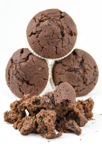 Chocolate muffins and crumbs — Stock Photo, Image