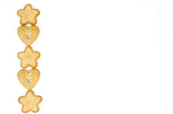 Star and heart shaped biscuits — Stock Photo, Image