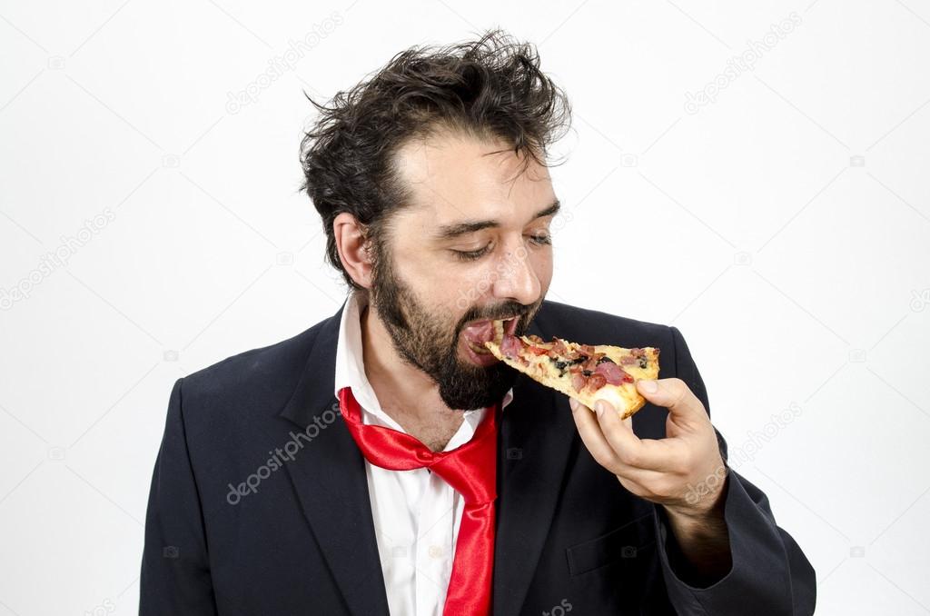 Man Biting A Slice Of Pizza