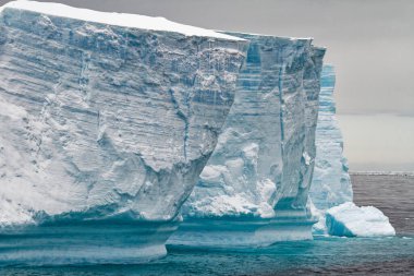Antarctica, Antarctic Peninsula, Palmer Archipelago, Neumayer Channel - Global warming - Fairytale landscape - Tabular Iceberg in Bransfield Strait clipart
