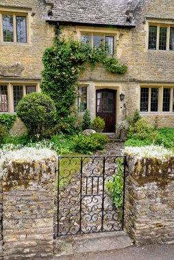Cotswold village of Bourton on the Water, Gloucestershire, England, United Kingdom. 25th of May 2015
