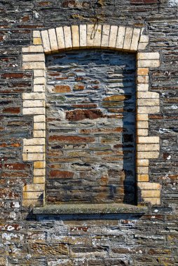 Old window closeup - Beautiful scenic village of Tintagel in Cornwall, England