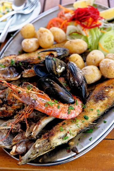 Food - Family Seafood Platter - Fresh seafood platter ready to be served - Grilled seafood - selection of seafood in a rustic setting