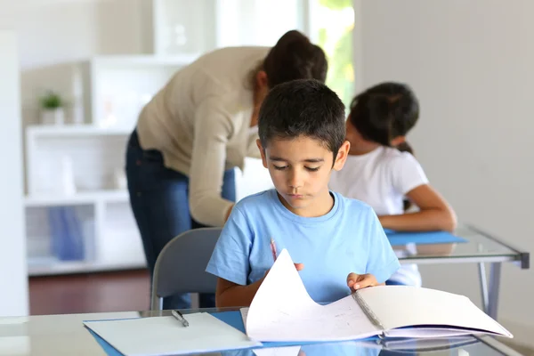 Children in class with teacher — Stock Photo, Image