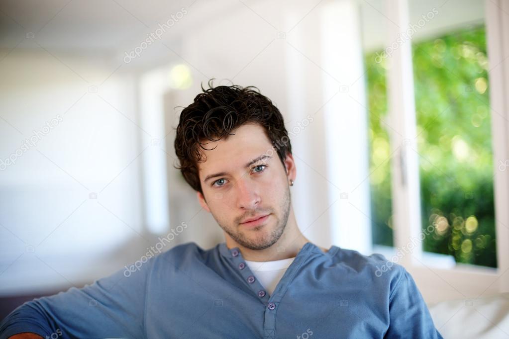 Portrait of young man looking at camera