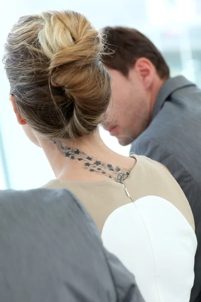 Back view of woman with tatoo — Stock Photo, Image