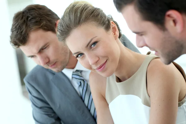 Businesswoman attending meeting with colleagues — Stock Photo, Image