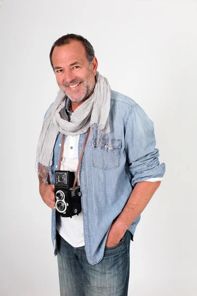 Fotograf steht auf weißem Hintergrund Stockbild
