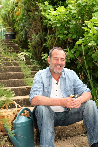 Senior man sitting in outdoor staircase — Stock Image Senior man sitting in outdoor staircase Stock Photo