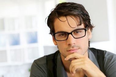 handsome young man with glasses