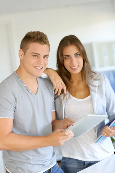 Portrait of cheerful students connected on digital tablet — Stock Photo, Image