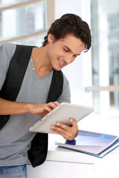 College student using digital tablet at school — Stock Photo, Image