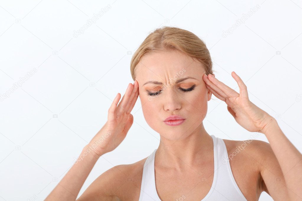 Portrait of woman having a headache