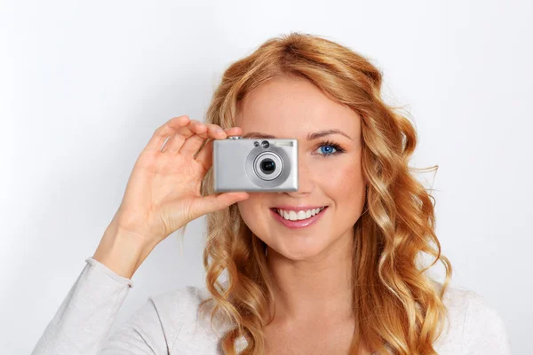 Portrait of beautiful blond woman taking picture — Stock Photo, Image