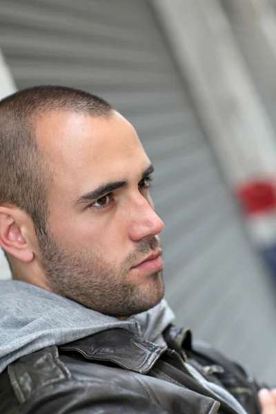 Portrait of bad boy waiting in the street — Stock Photo, Image