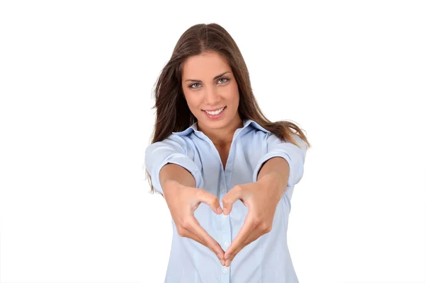 Mooie vrouw doen heartshape met handen — Stockfoto