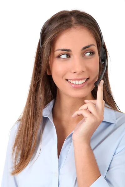 Portrait of smiling woman with headset on — Stock Photo, Image