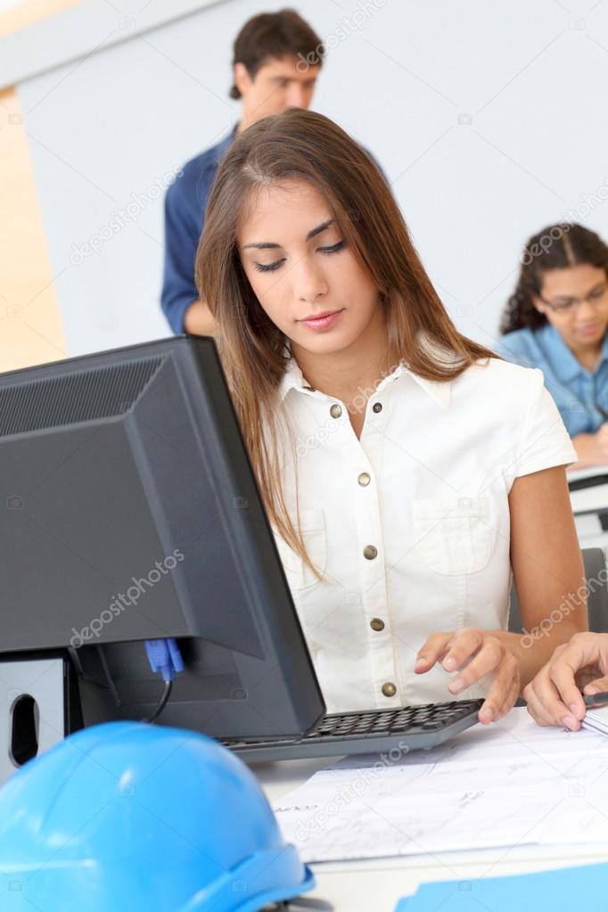 Student in class working on computer