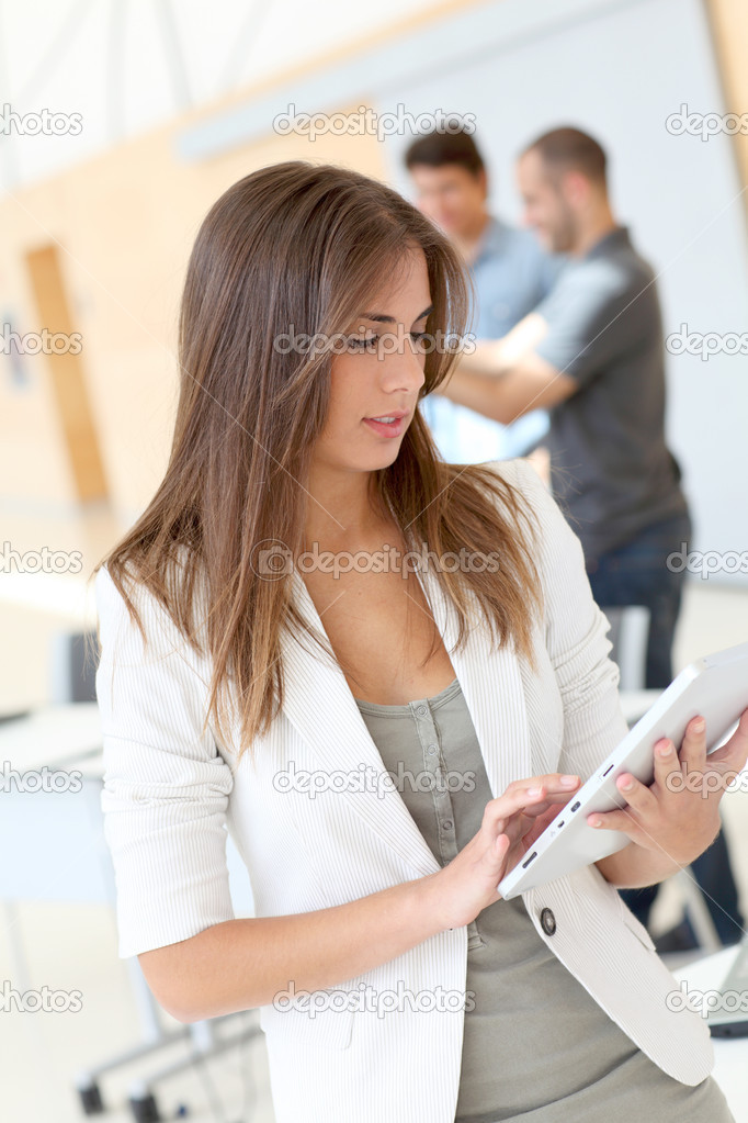 College student using electronic tablet