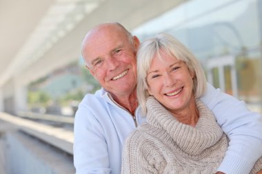 Portrait of smiling senior couple clipart