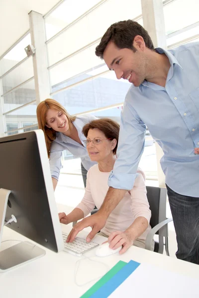 Senior attending business training — Stock Photo, Image