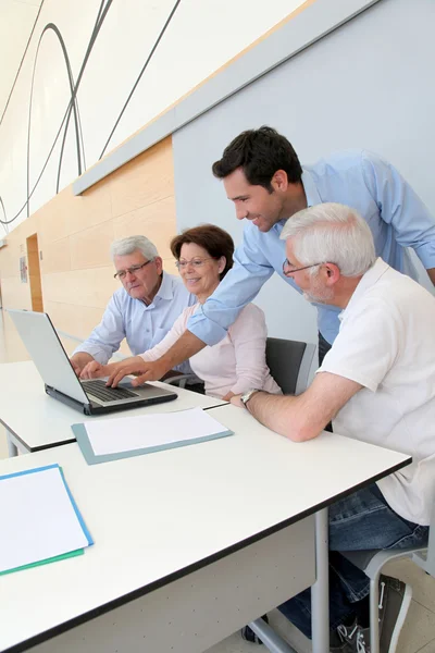 Group of senior attending job search meeting — Stock Photo, Image