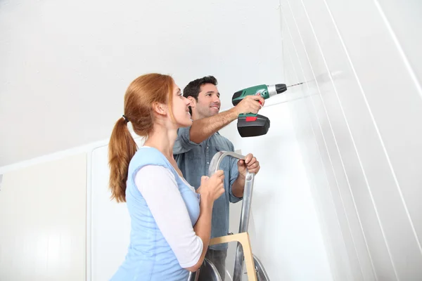 Young couple renovating their new house — Stock Photo, Image