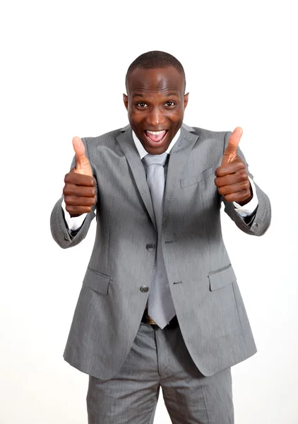 Hombre de negocios alegre con los pulgares hacia arriba — Foto de Stock