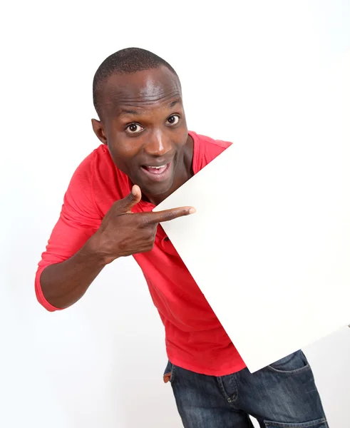 Man in red shirt showing whiteboard — Stock Photo, Image