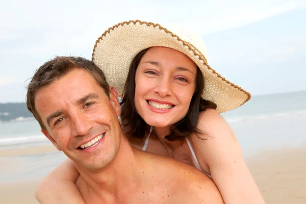 Happy loving couple at the beach Stock Picture